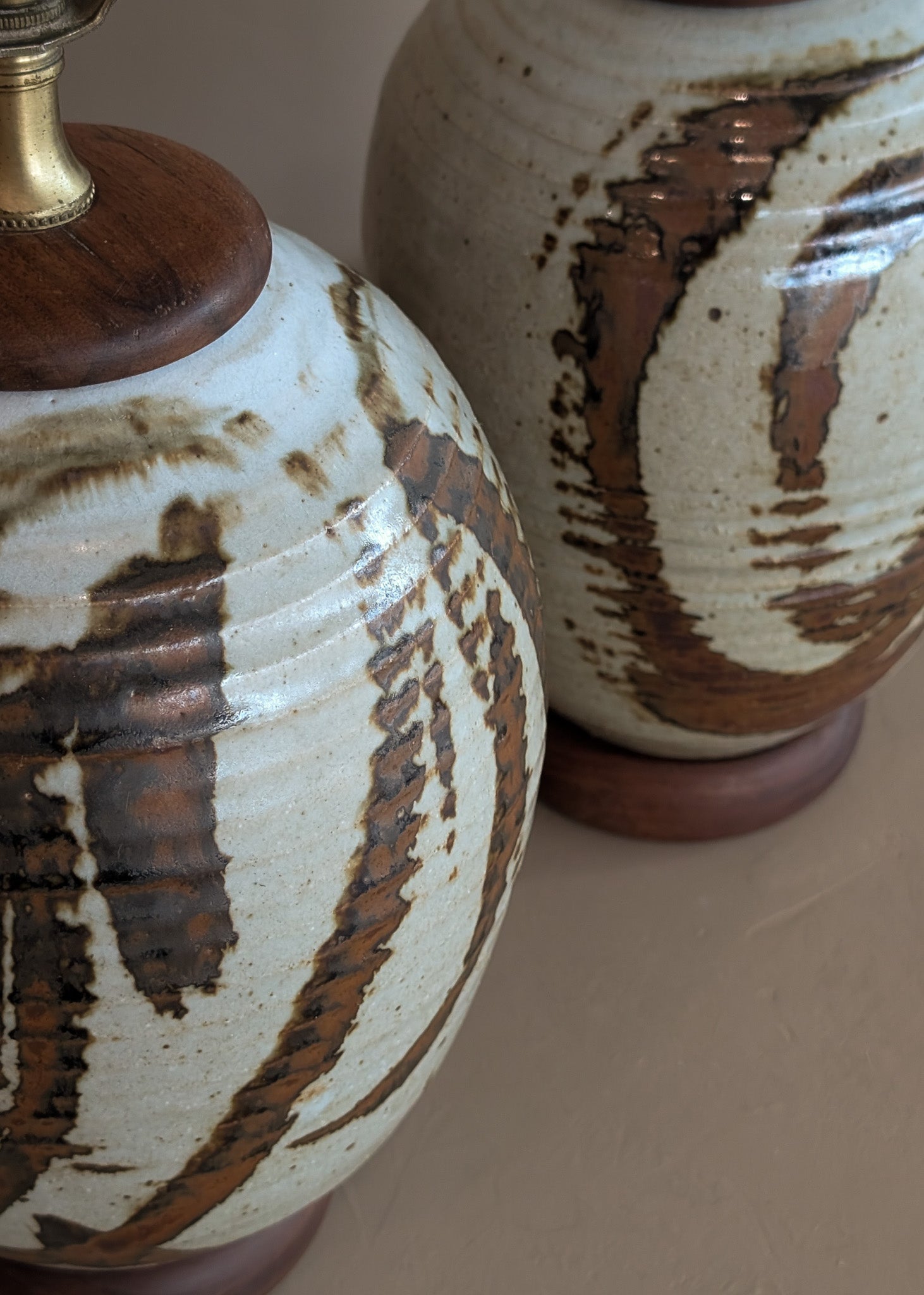 Pair of Vintage Neutral Studio Pottery and Teak Wood Lamps with Freeform Detailing