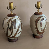 Pair of Vintage Neutral Studio Pottery and Teak Wood Lamps with Freeform Detailing