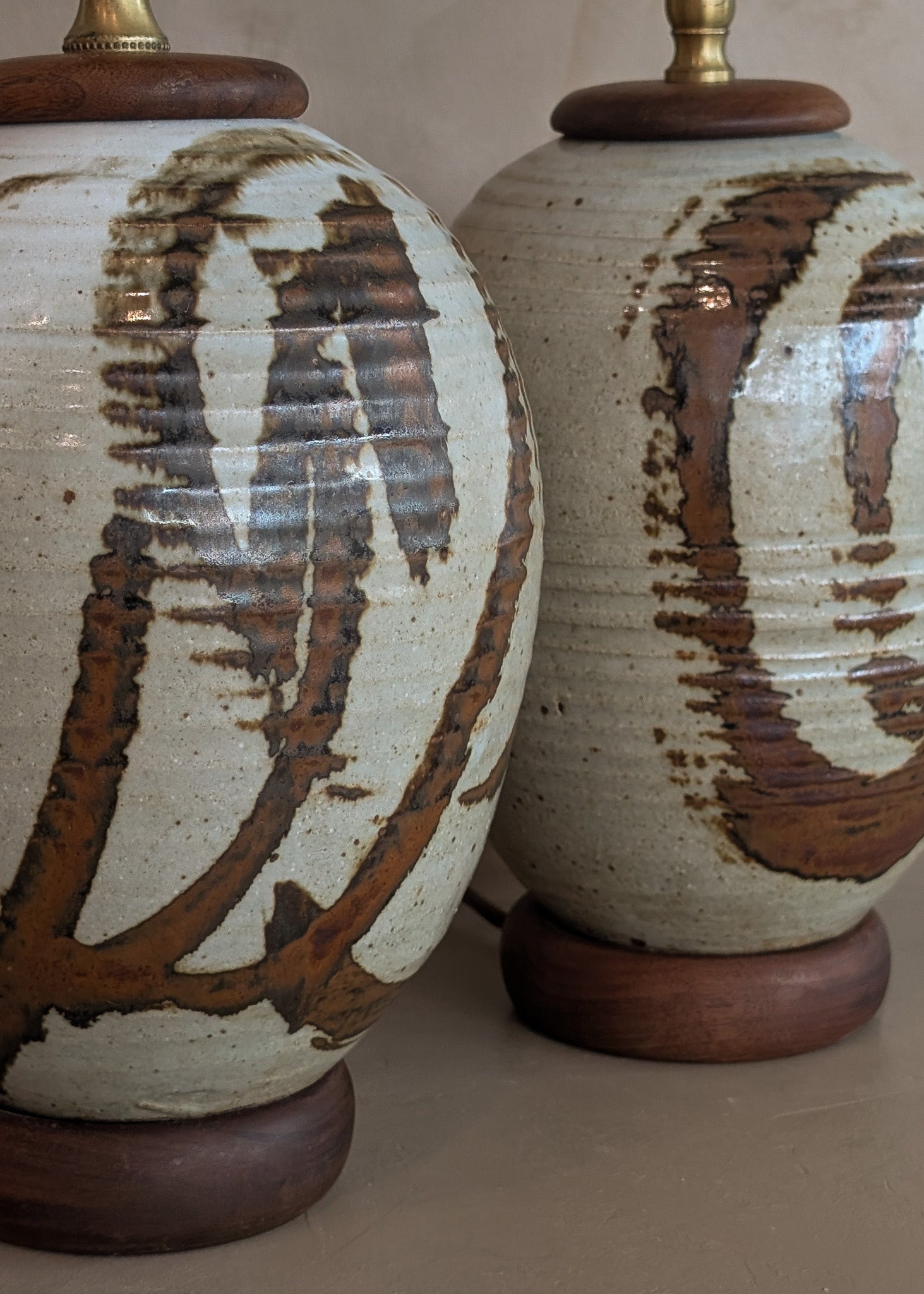 Pair of Vintage Neutral Studio Pottery and Teak Wood Lamps with Freeform Detailing