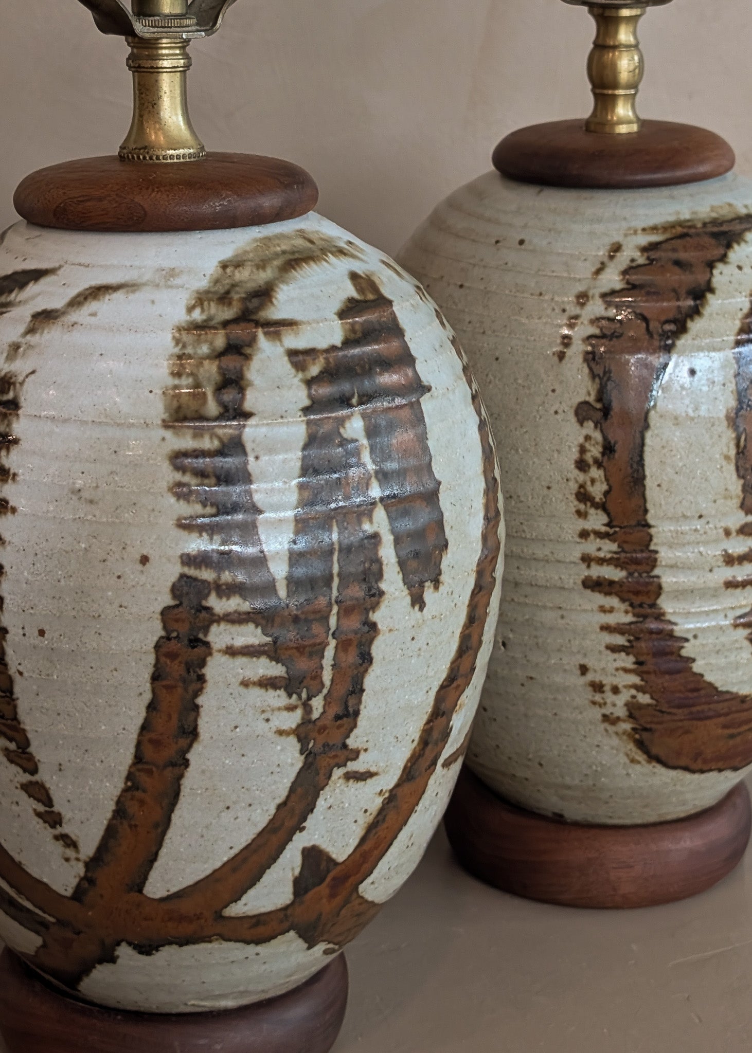 Pair of Vintage Neutral Studio Pottery and Teak Wood Lamps with Freeform Detailing