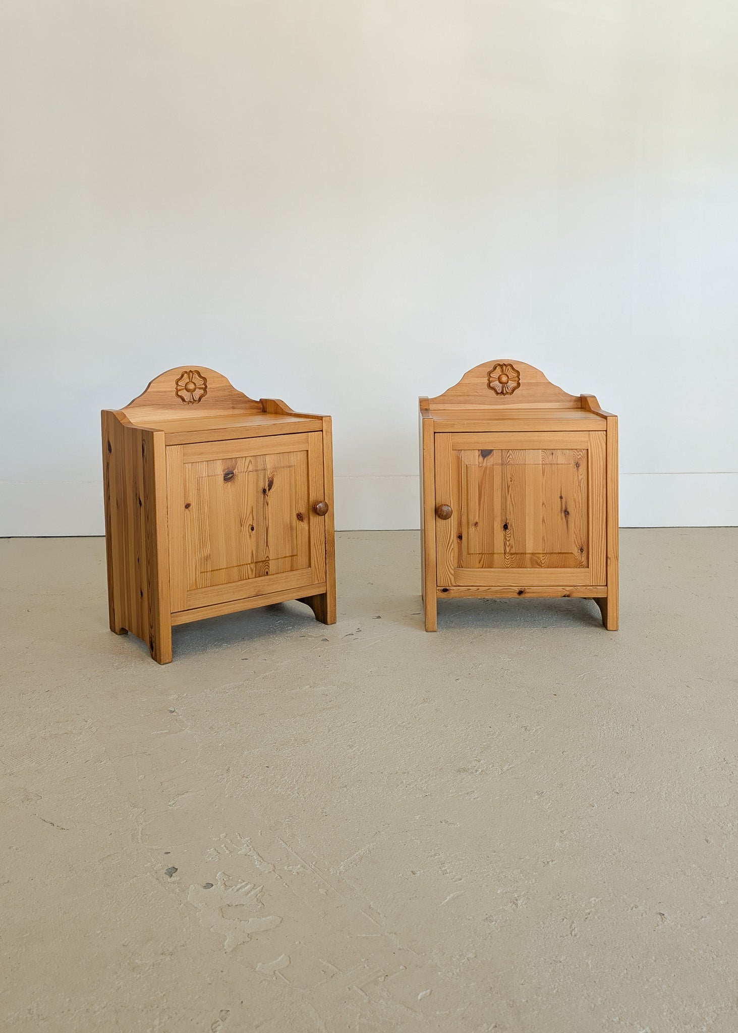 Pair of Vintage Swedish Light Pine Wooden Nightstands with Floral Motif Carving