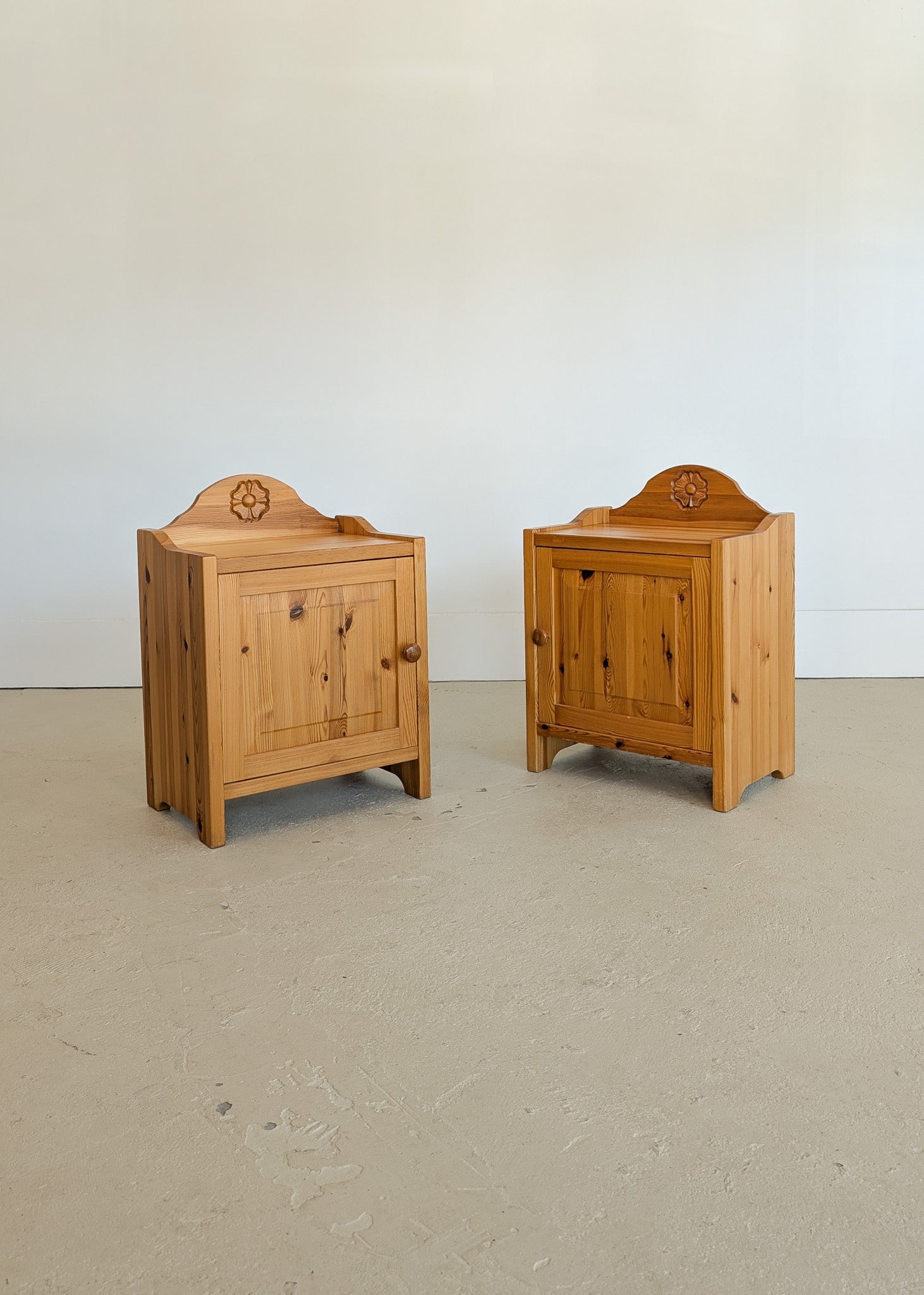 Pair of Vintage Swedish Light Pine Wooden Nightstands with Floral Motif Carving