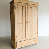 Antique European Light Pine Cabinet with Hand-Carved Detailing and Bottom Drawer