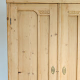 Antique European Light Pine Cabinet with Hand-Carved Detailing and Bottom Drawer