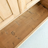 Antique European Light Pine Cabinet with Hand-Carved Detailing and Bottom Drawer