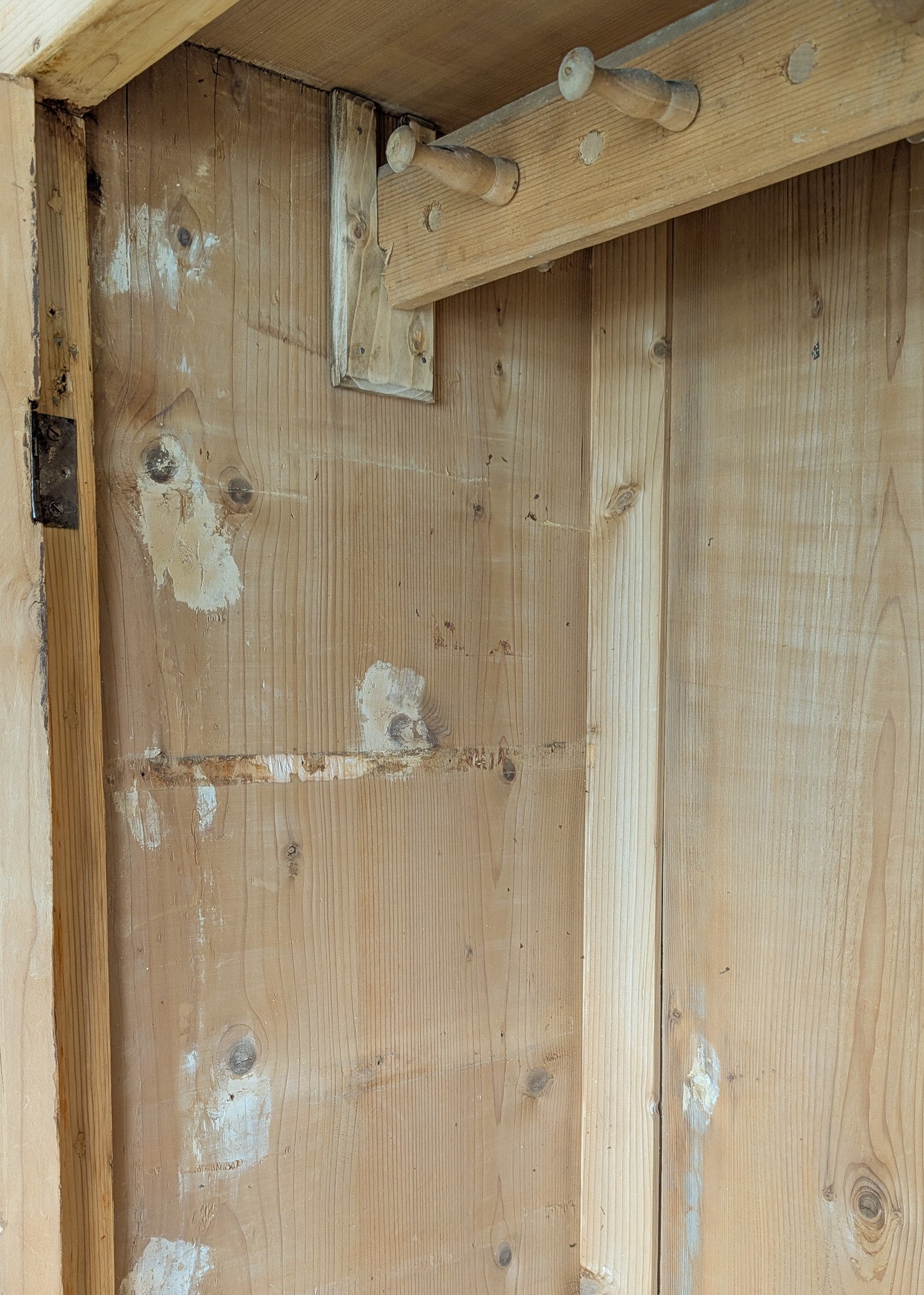 Antique European Light Pine Cabinet with Hand-Carved Detailing and Bottom Drawer