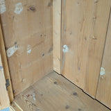 Antique European Light Pine Cabinet with Hand-Carved Detailing and Bottom Drawer