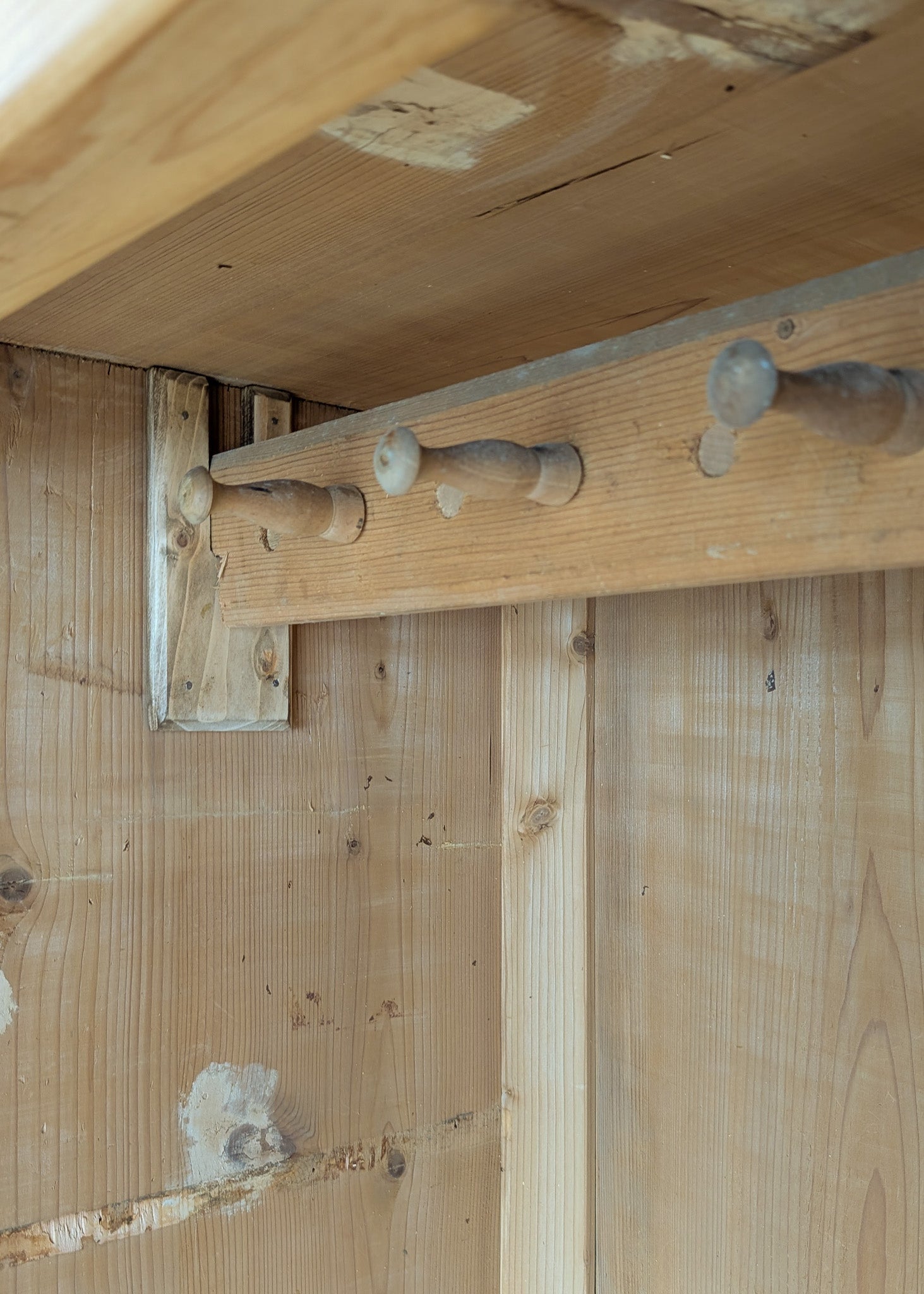 Antique European Light Pine Cabinet with Hand-Carved Detailing and Bottom Drawer