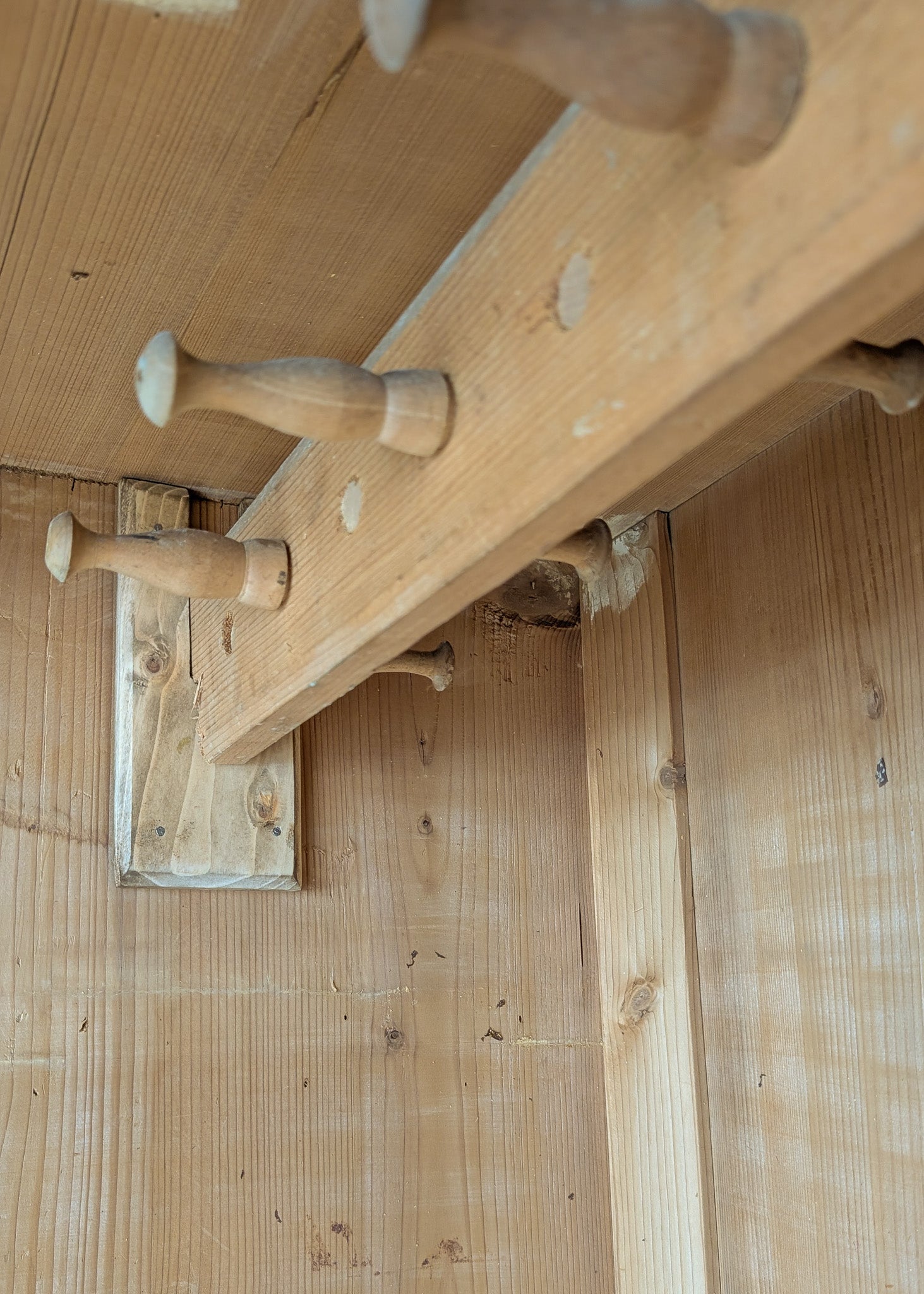 Antique European Light Pine Cabinet with Hand-Carved Detailing and Bottom Drawer