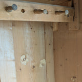 Antique European Light Pine Cabinet with Hand-Carved Detailing and Bottom Drawer