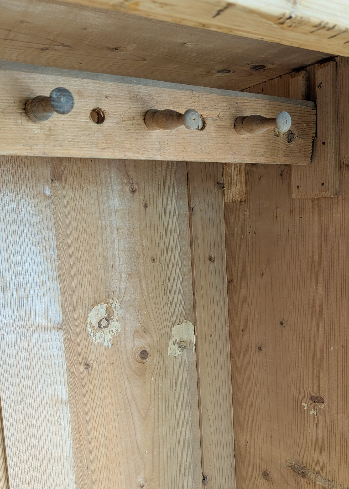 Antique European Light Pine Cabinet with Hand-Carved Detailing and Bottom Drawer