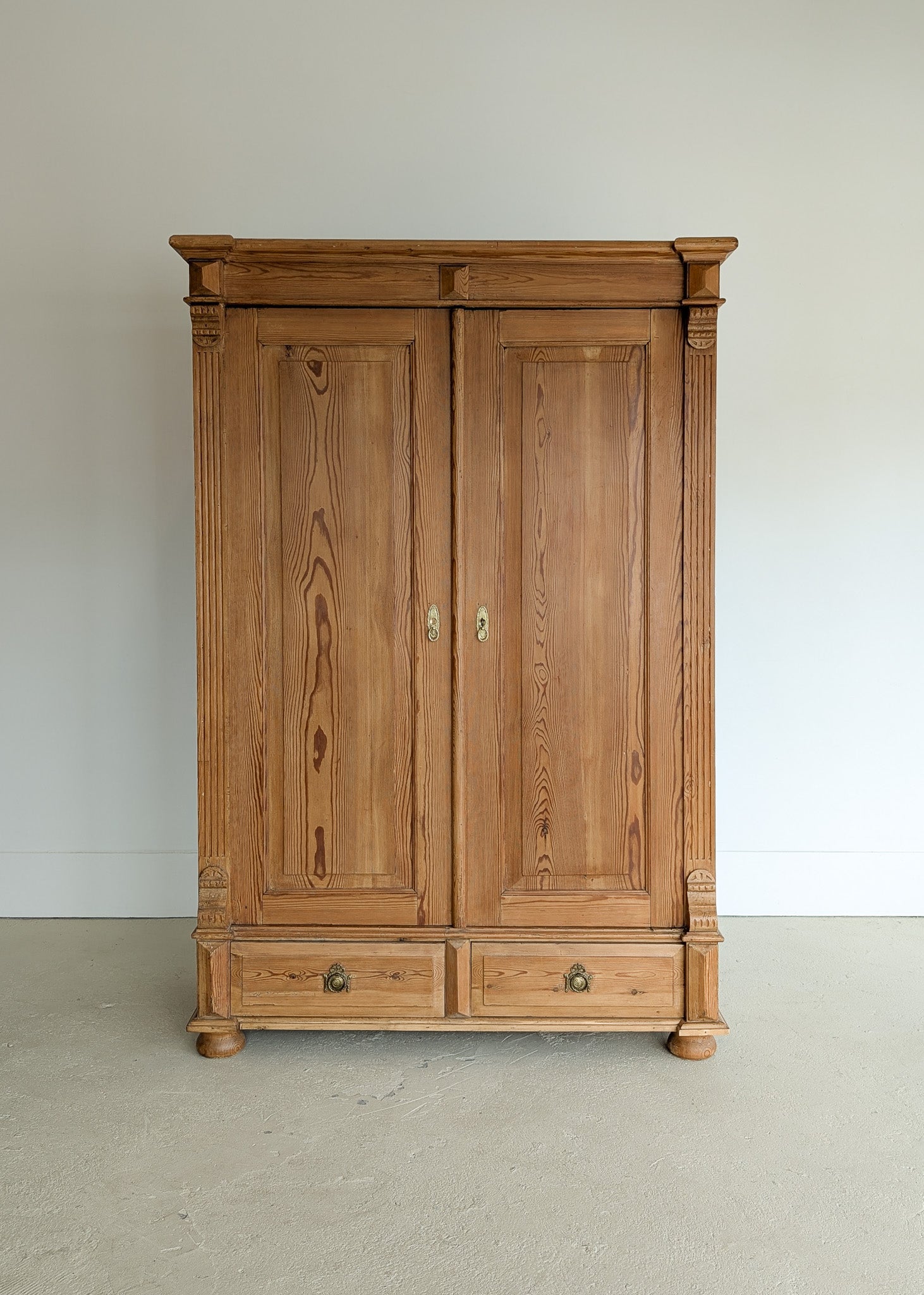 Handsome Antique European Pine Two-Door Cabinet with Bottom Drawer and Skeleton Key