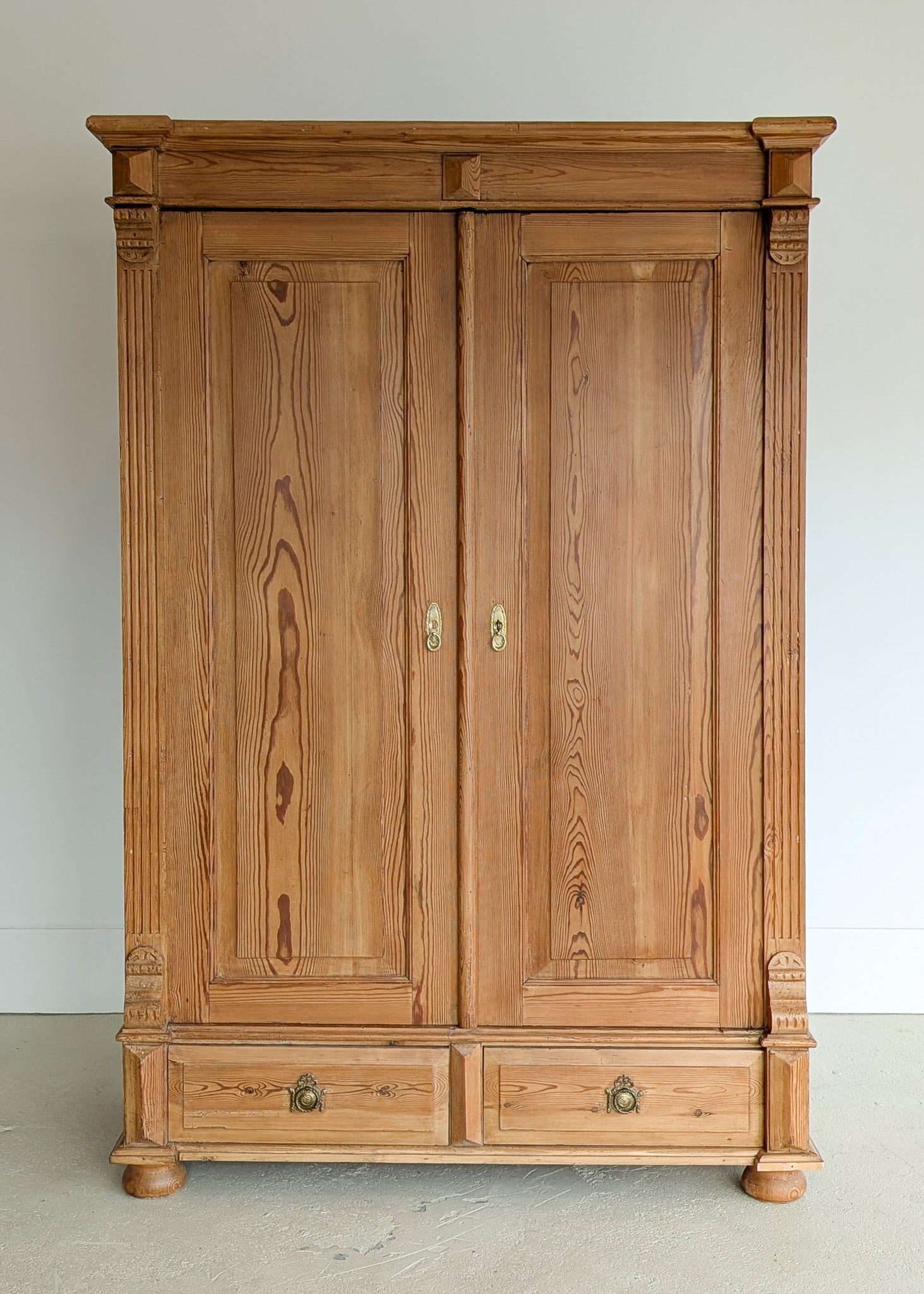 Handsome Antique European Pine Two-Door Cabinet with Bottom Drawer and Skeleton Key