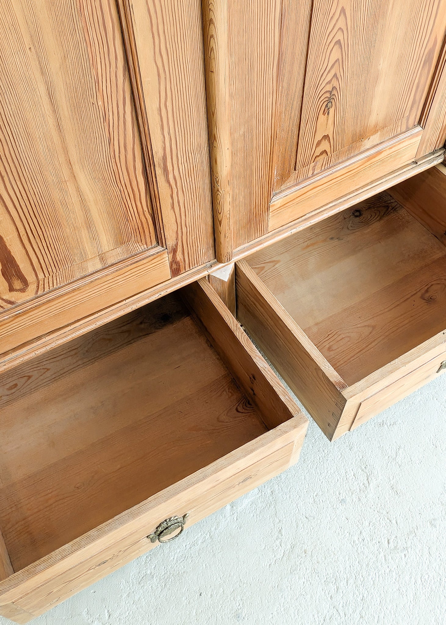 Handsome Antique European Pine Two-Door Cabinet with Bottom Drawer and Skeleton Key