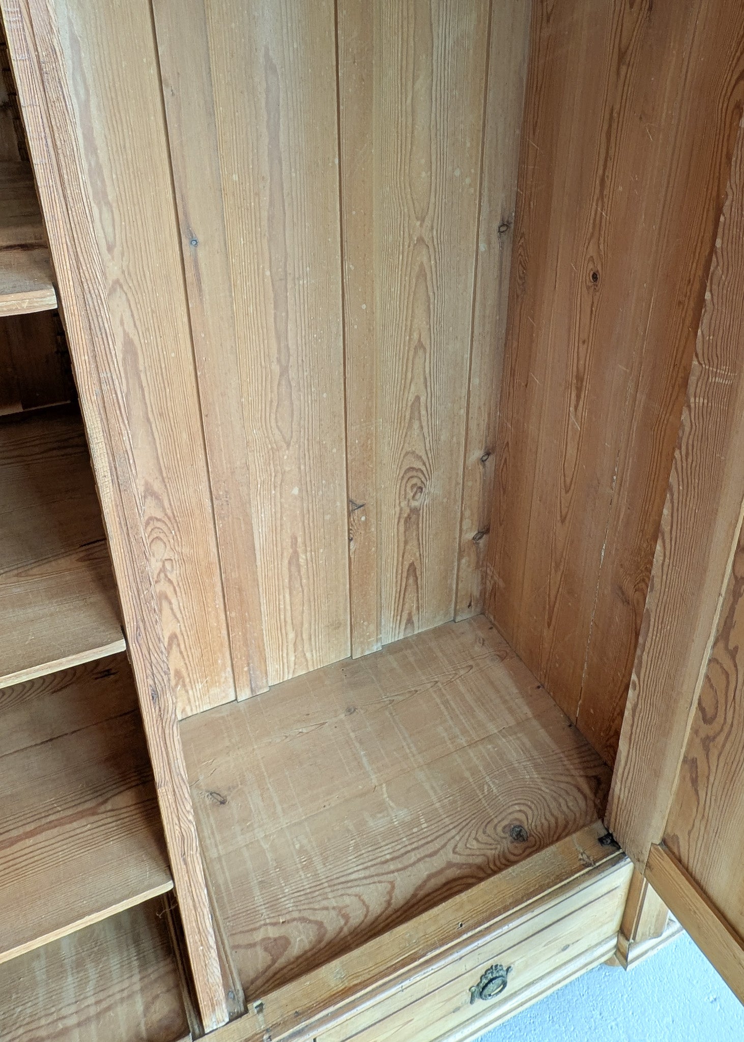 Handsome Antique European Pine Two-Door Cabinet with Bottom Drawer and Skeleton Key