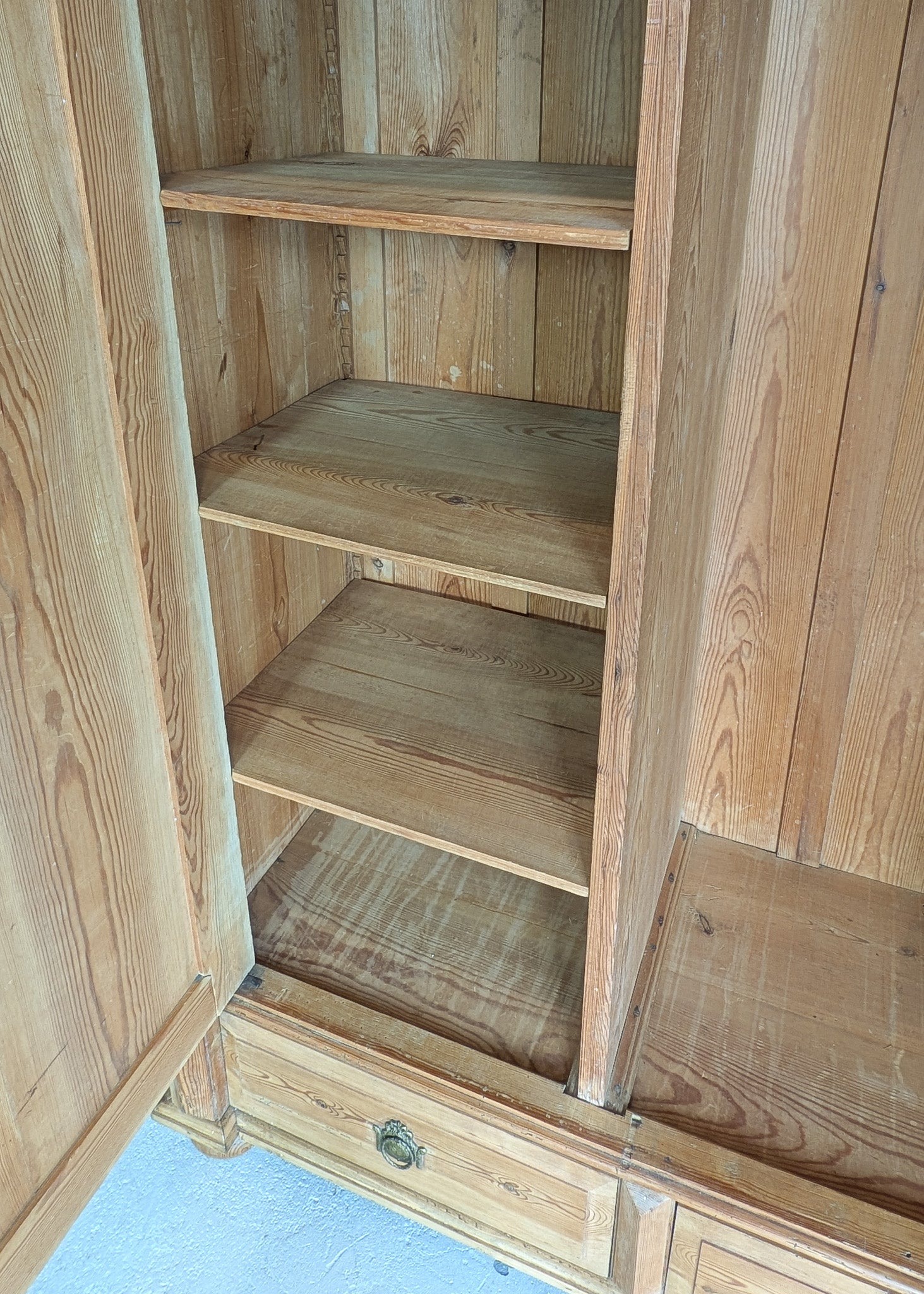 Handsome Antique European Pine Two-Door Cabinet with Bottom Drawer and Skeleton Key
