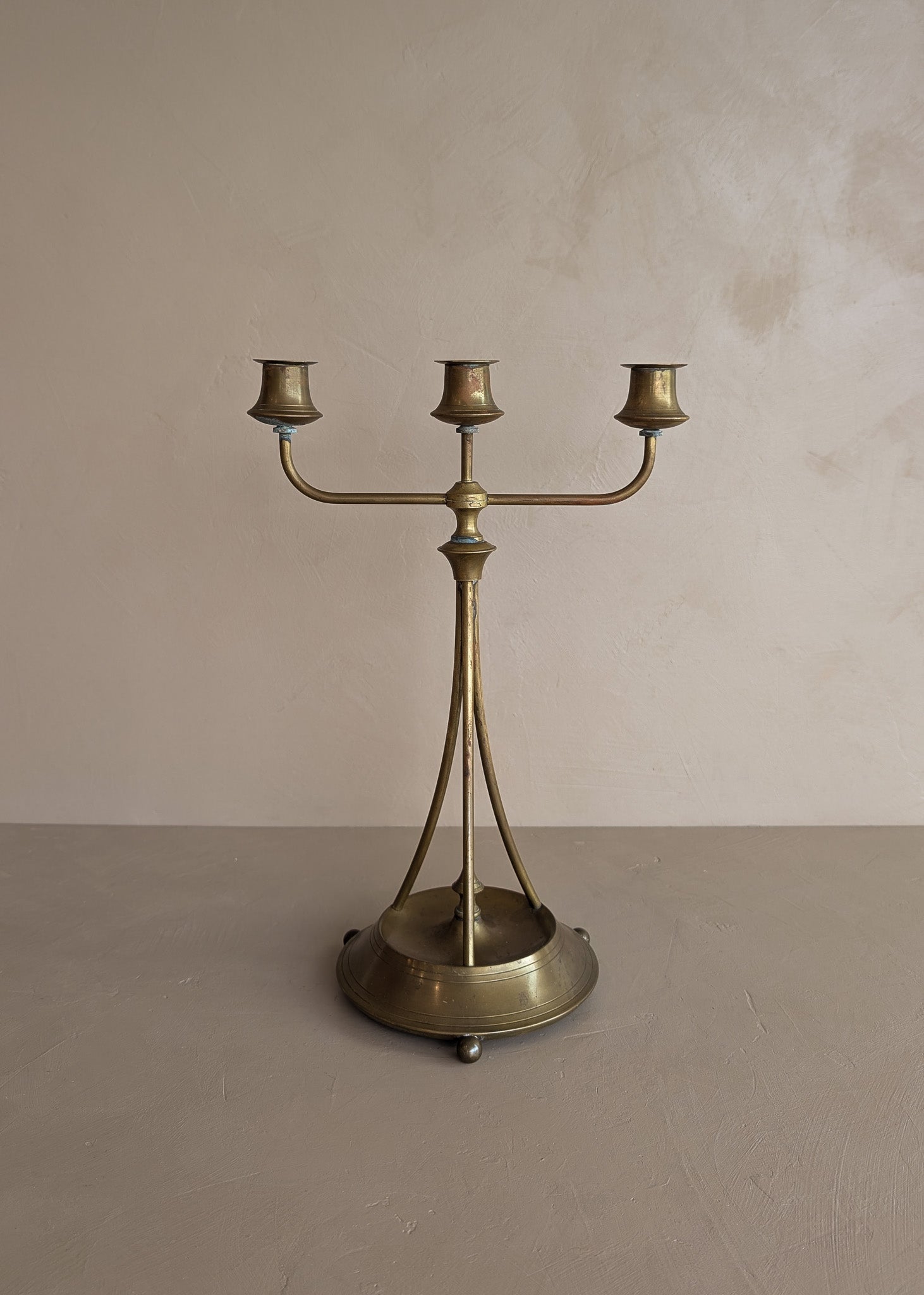 Antique Swedish Oscar Nilsson Brass Art Nouveau-Style Three-Arm Candelabra with Ball Feet