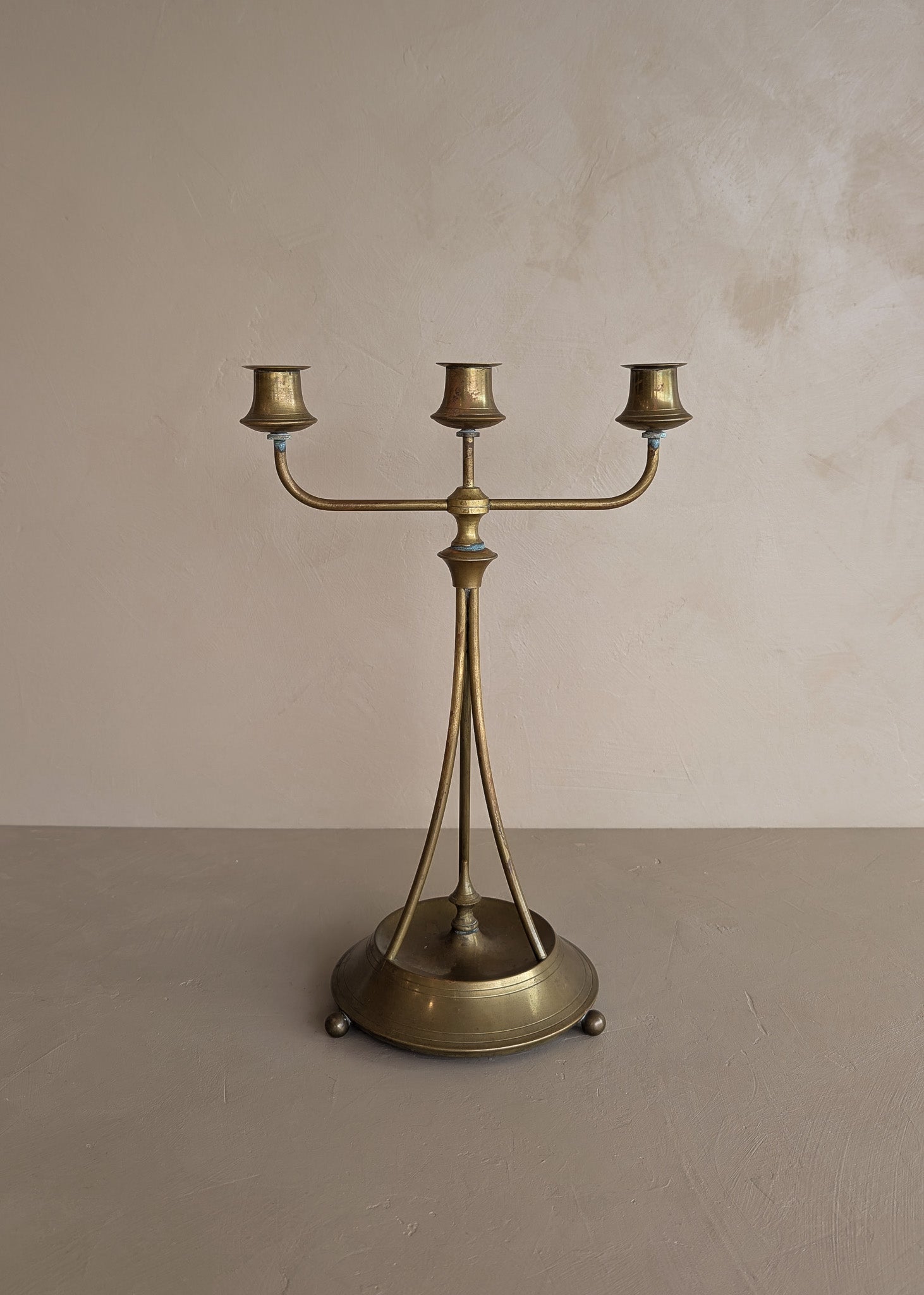 Antique Swedish Oscar Nilsson Brass Art Nouveau-Style Three-Arm Candelabra with Ball Feet