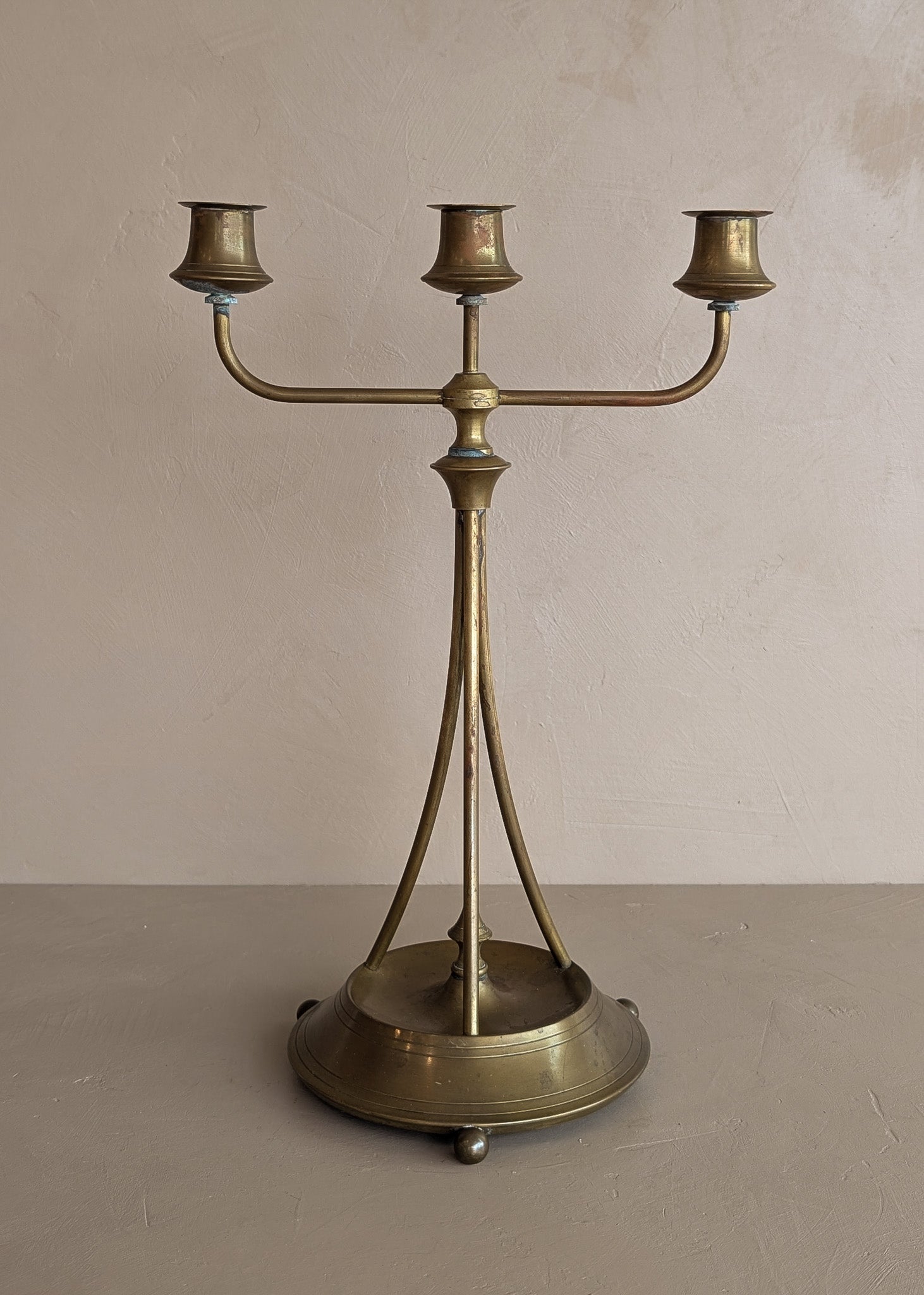 Antique Swedish Oscar Nilsson Brass Art Nouveau-Style Three-Arm Candelabra with Ball Feet