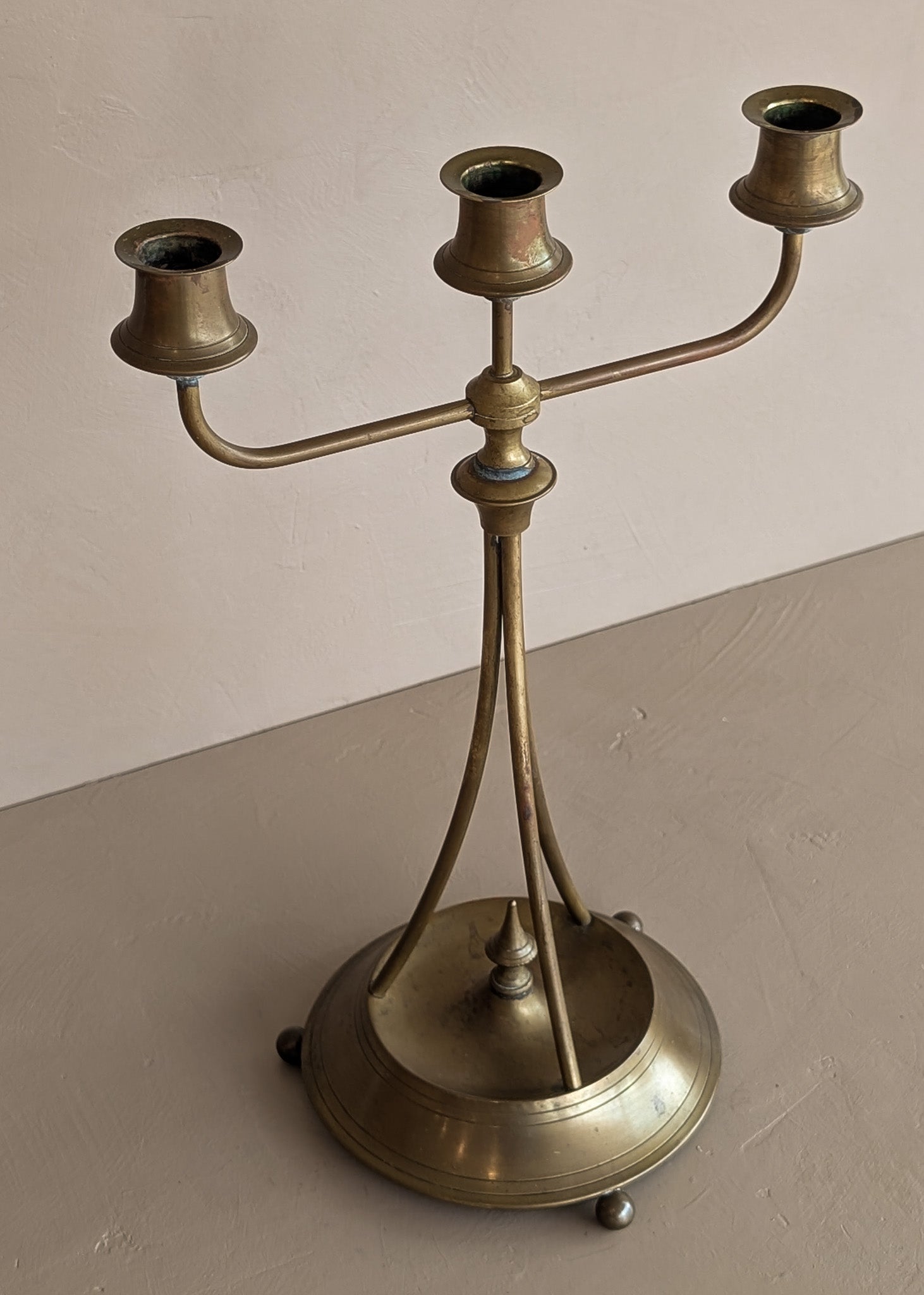 Antique Swedish Oscar Nilsson Brass Art Nouveau-Style Three-Arm Candelabra with Ball Feet