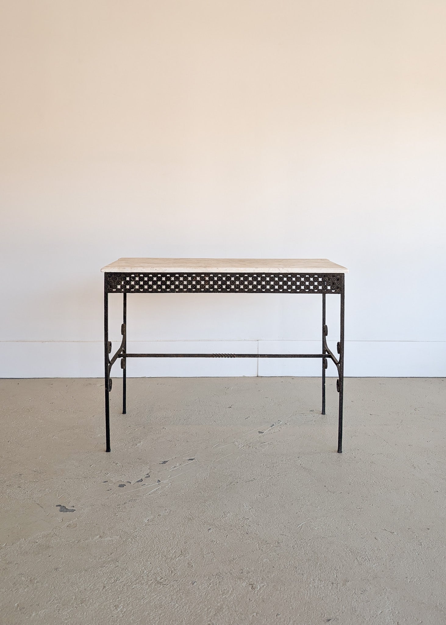 Antique French Marble-Top Console Table with Wrought Iron Base and Quatrefoil Apron and Scroll Detailing