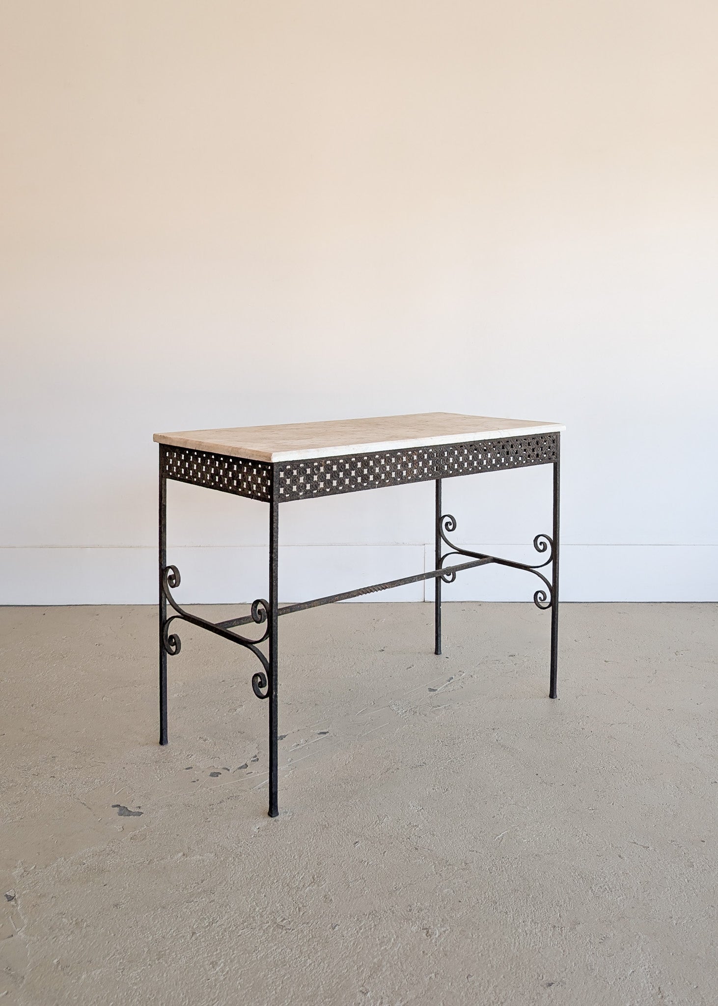Antique French Marble-Top Console Table with Wrought Iron Base and Quatrefoil Apron and Scroll Detailing