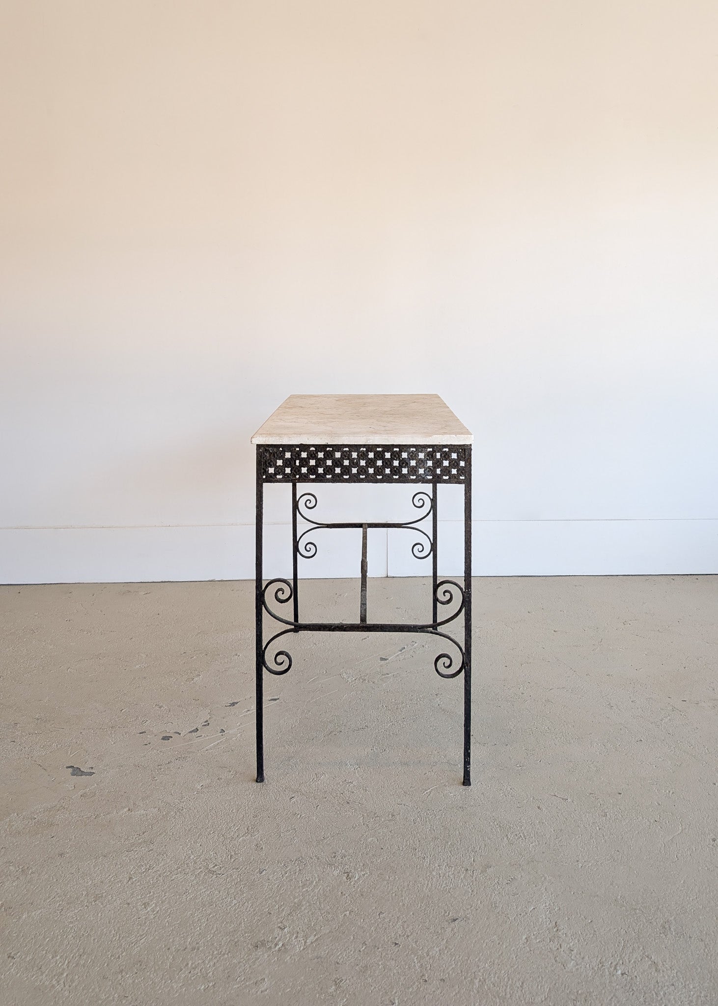 Antique French Marble-Top Console Table with Wrought Iron Base and Quatrefoil Apron and Scroll Detailing
