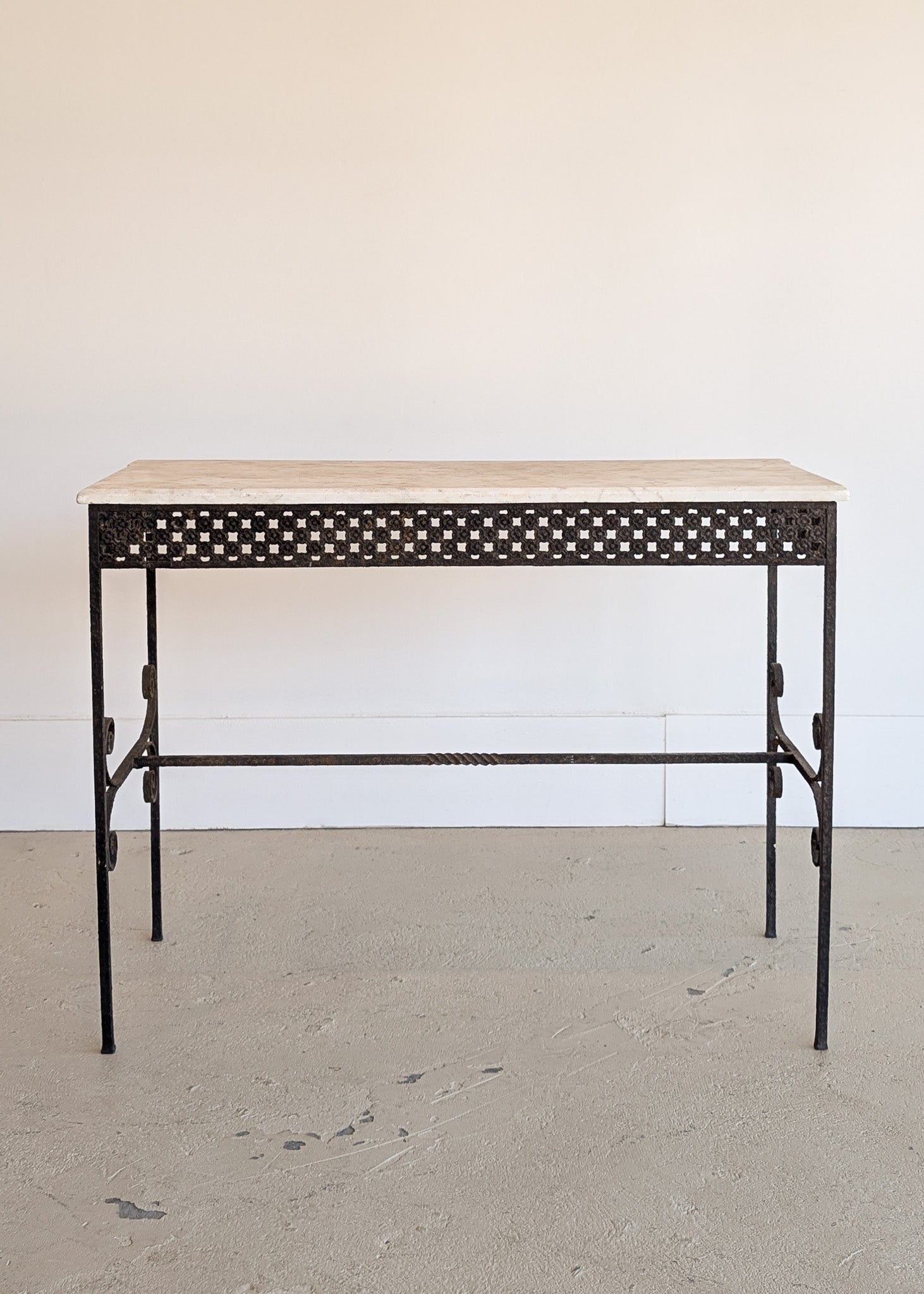 Antique French Marble-Top Console Table with Wrought Iron Base and Quatrefoil Apron and Scroll Detailing