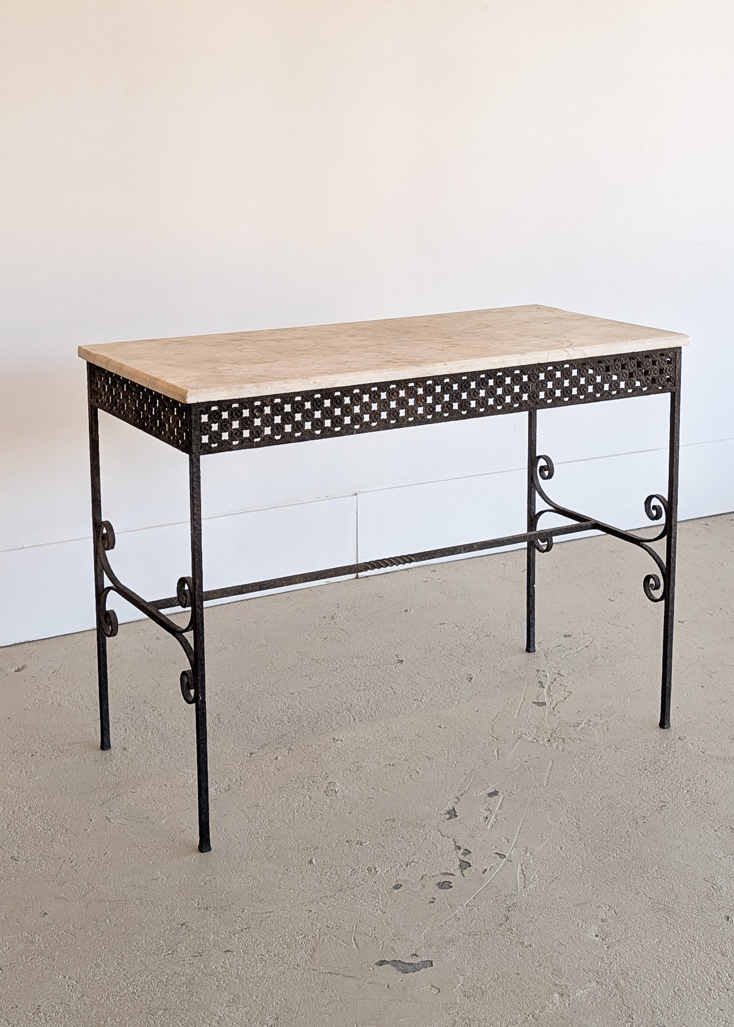 Antique French Marble-Top Console Table with Wrought Iron Base and Quatrefoil Apron and Scroll Detailing