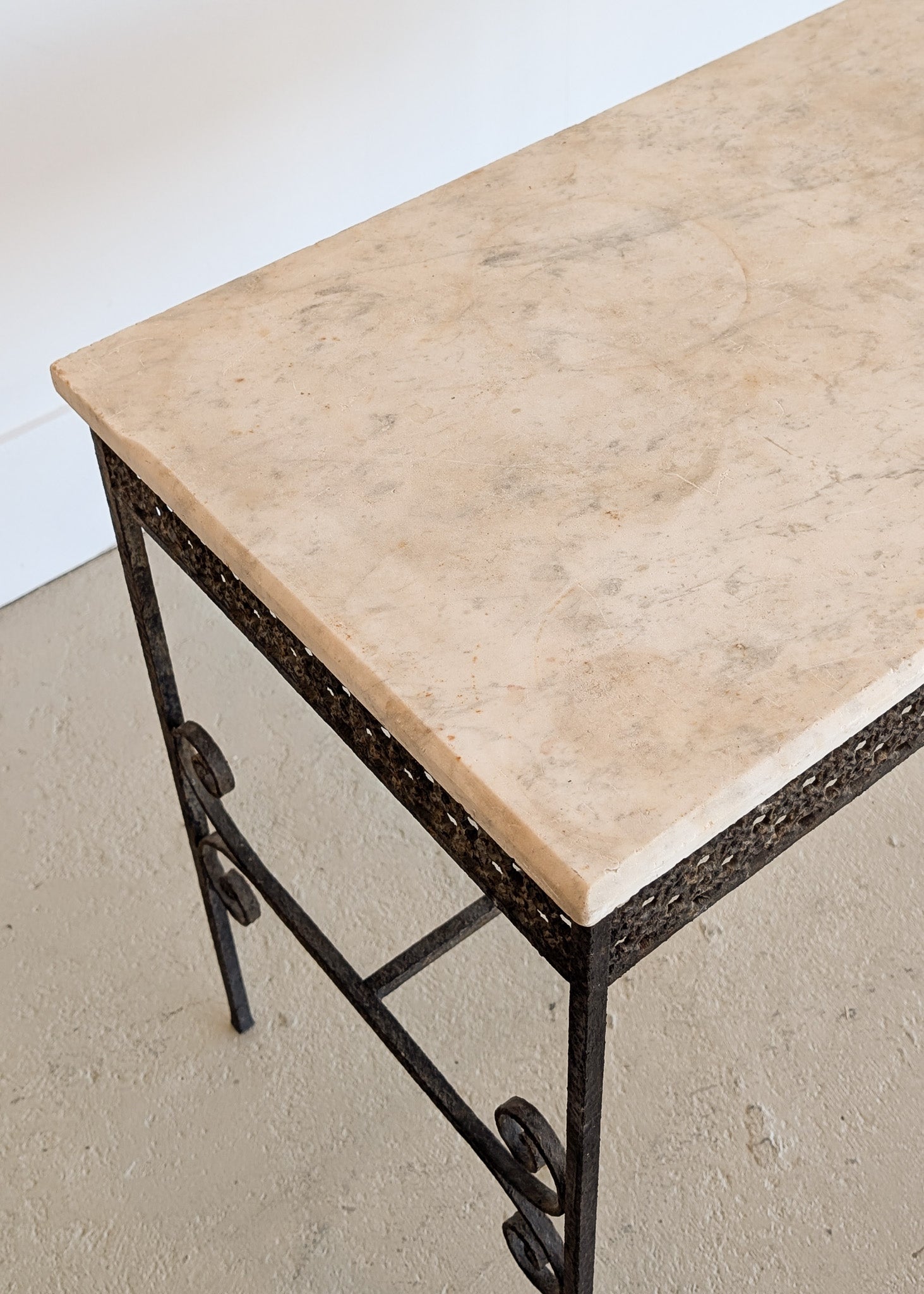 Antique French Marble-Top Console Table with Wrought Iron Base and Quatrefoil Apron and Scroll Detailing