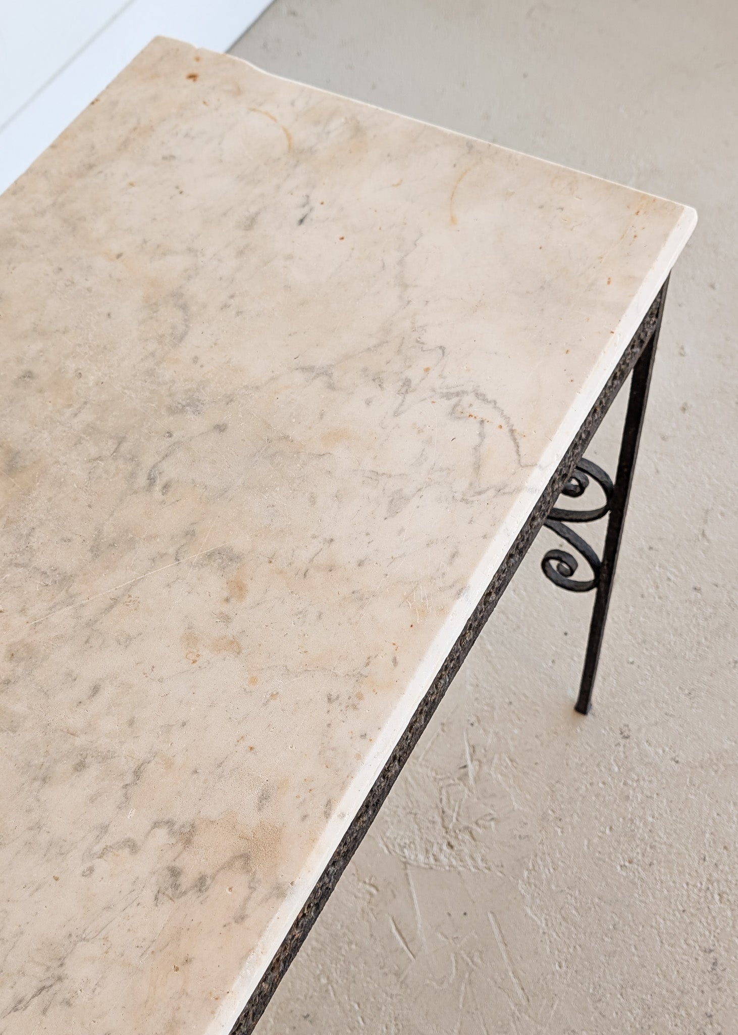 Antique French Marble-Top Console Table with Wrought Iron Base and Quatrefoil Apron and Scroll Detailing