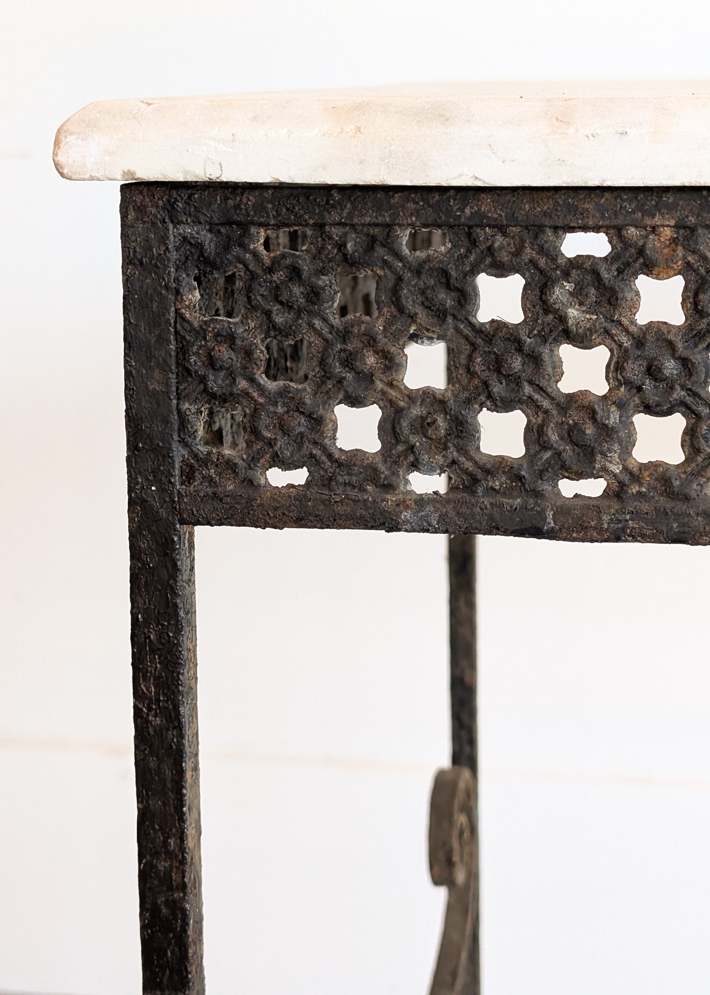 Antique French Marble-Top Console Table with Wrought Iron Base and Quatrefoil Apron and Scroll Detailing