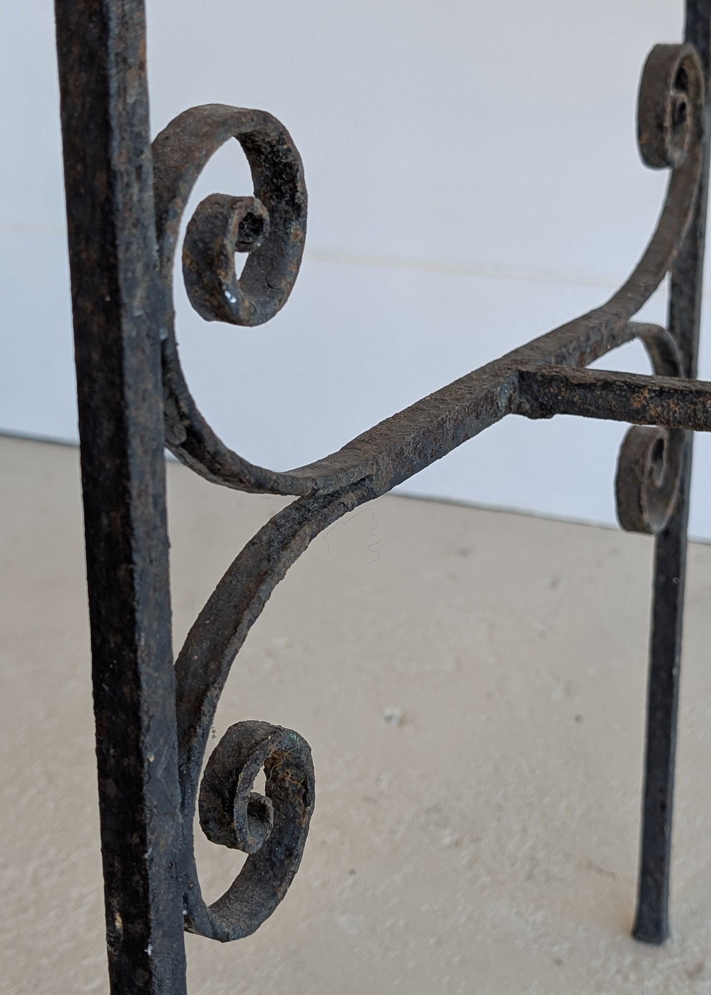 Antique French Marble-Top Console Table with Wrought Iron Base and Quatrefoil Apron and Scroll Detailing