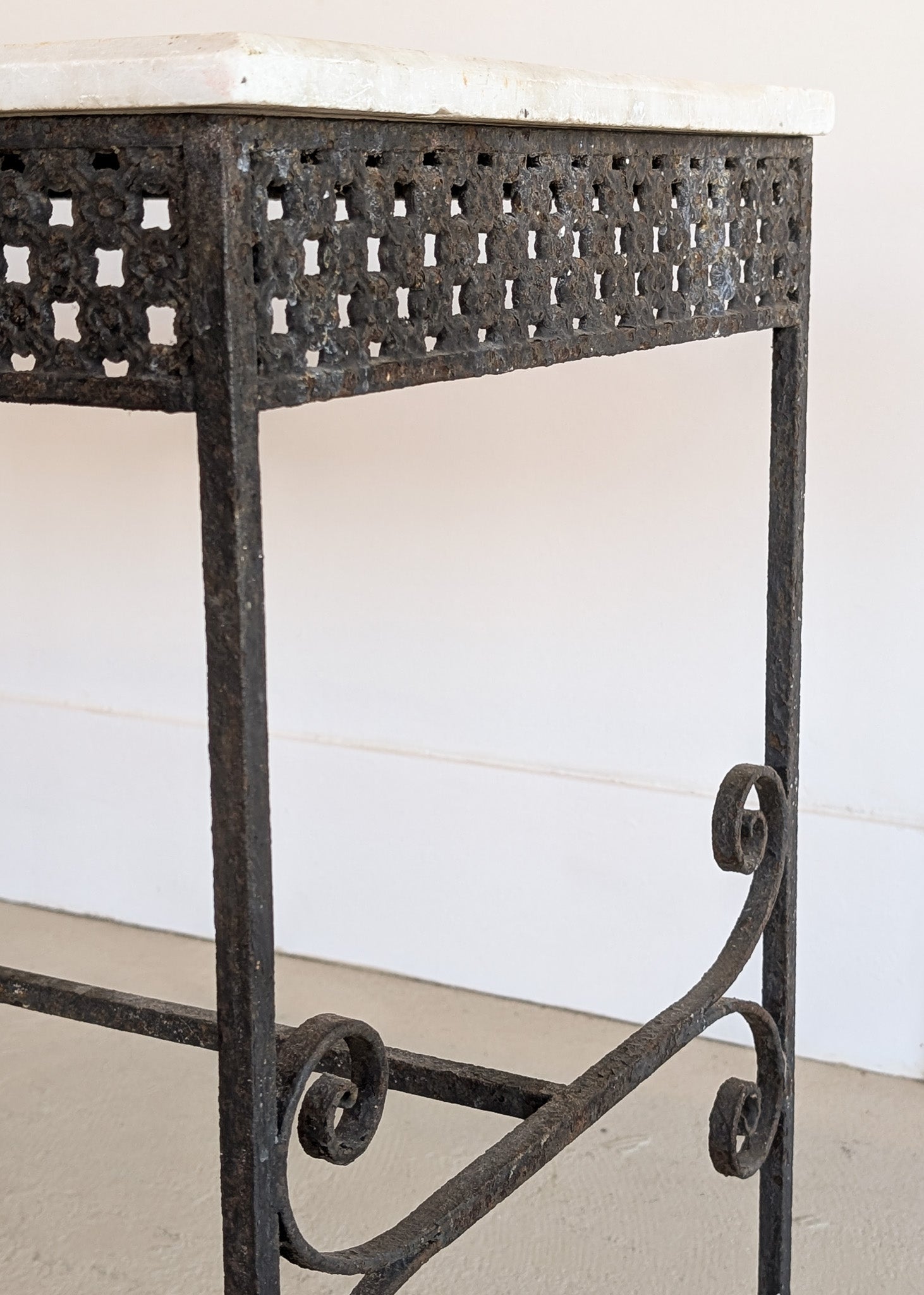 Antique French Marble-Top Console Table with Wrought Iron Base and Quatrefoil Apron and Scroll Detailing
