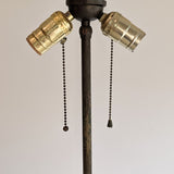 Six-Foot-Tall Antique European Charles Dudouyt-Style Wooden Oak Two-Light Spindle Floor Lamp with Bell-Shaped Base and Ball Feet