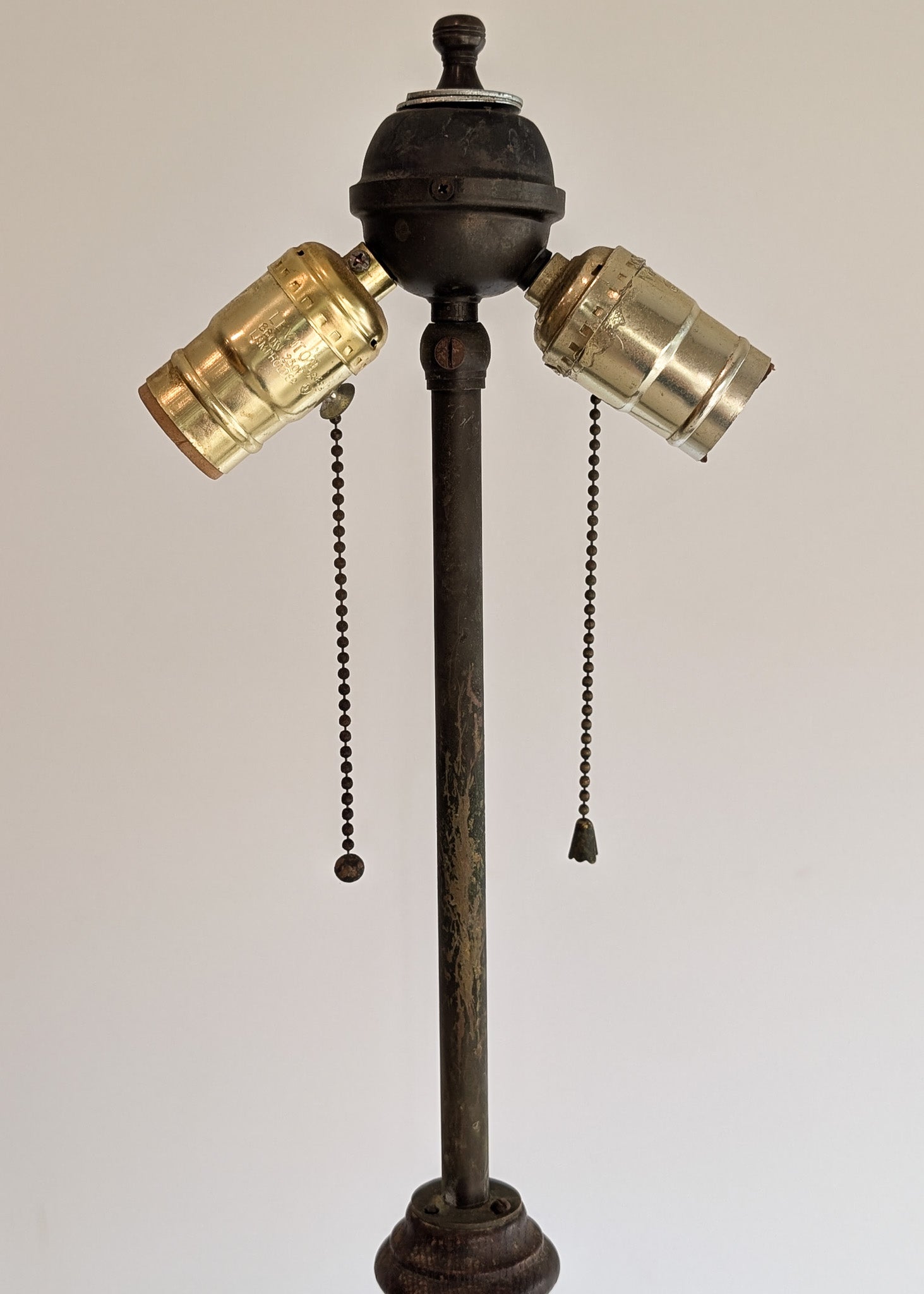Six-Foot-Tall Antique European Charles Dudouyt-Style Wooden Oak Two-Light Spindle Floor Lamp with Bell-Shaped Base and Ball Feet