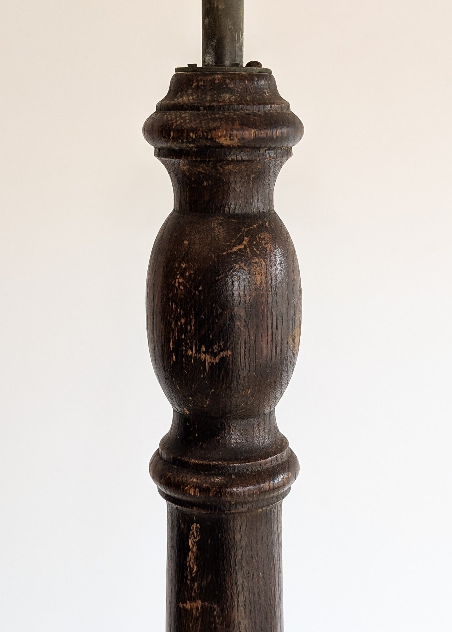 Six-Foot-Tall Antique European Charles Dudouyt-Style Wooden Oak Two-Light Spindle Floor Lamp with Bell-Shaped Base and Ball Feet