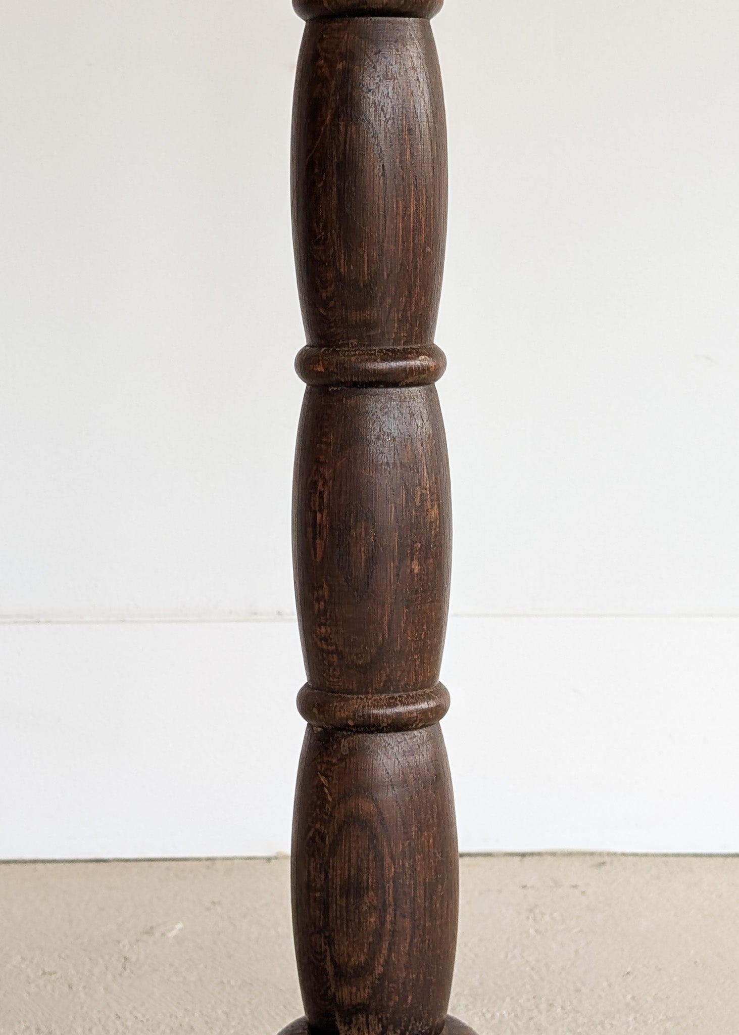 Six-Foot-Tall Antique European Charles Dudouyt-Style Wooden Oak Two-Light Spindle Floor Lamp with Bell-Shaped Base and Ball Feet