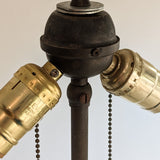 Six-Foot-Tall Antique European Charles Dudouyt-Style Wooden Oak Two-Light Spindle Floor Lamp with Bell-Shaped Base and Ball Feet