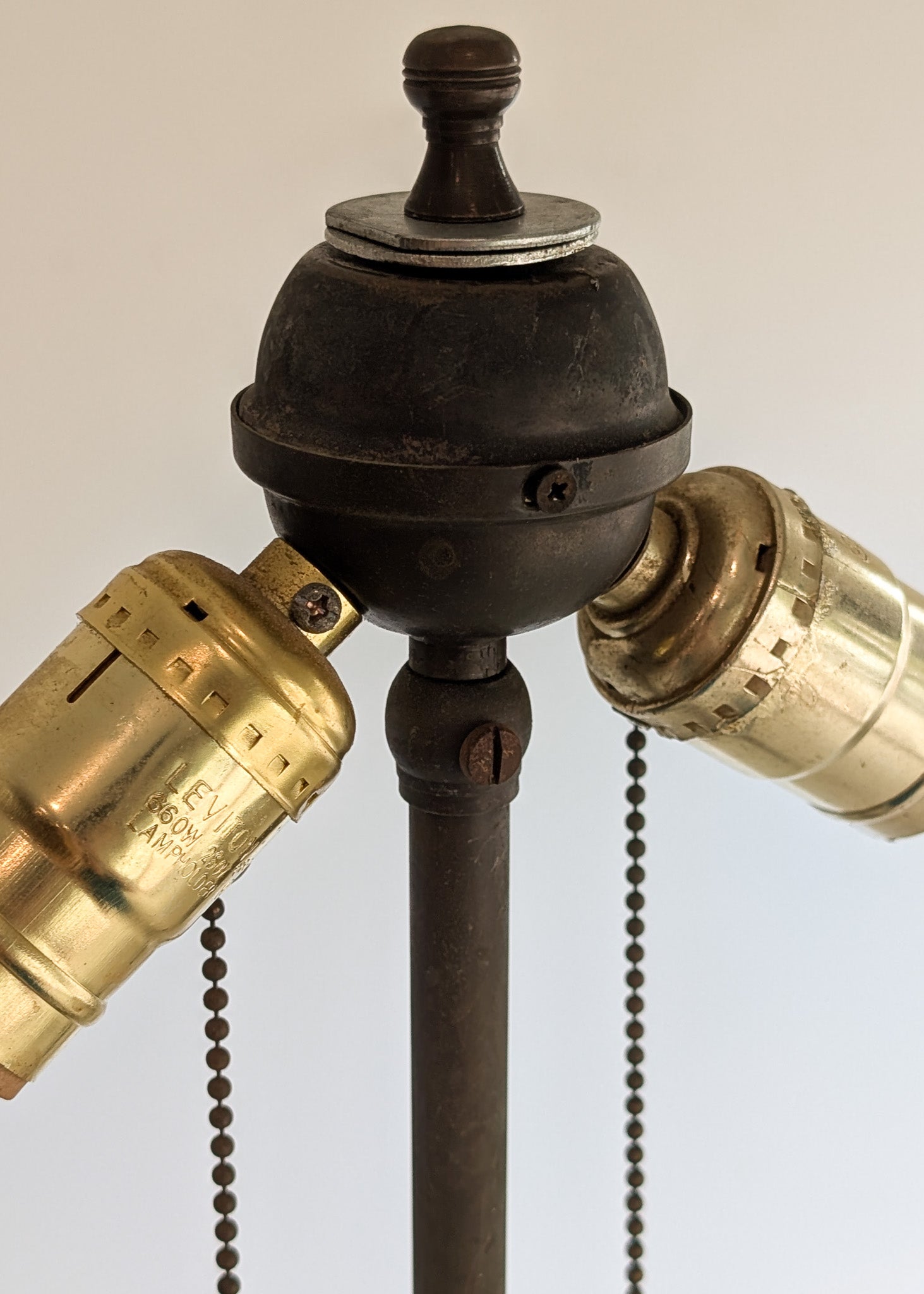 Six-Foot-Tall Antique European Charles Dudouyt-Style Wooden Oak Two-Light Spindle Floor Lamp with Bell-Shaped Base and Ball Feet
