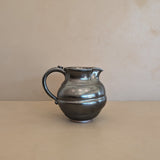 Dark Metallic-Glazed Studio Pottery Pitcher with Swirled Detailing