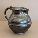 Dark Metallic-Glazed Studio Pottery Pitcher with Swirled Detailing