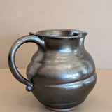 Dark Metallic-Glazed Studio Pottery Pitcher with Swirled Detailing