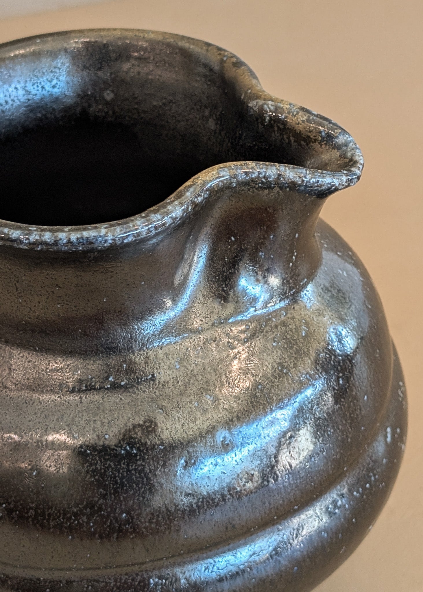 Dark Metallic-Glazed Studio Pottery Pitcher with Swirled Detailing