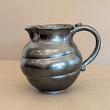 Dark Metallic-Glazed Studio Pottery Pitcher with Swirled Detailing